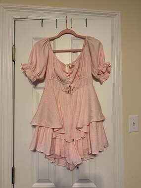 Saints + Secrets pink tiered ruffle romper